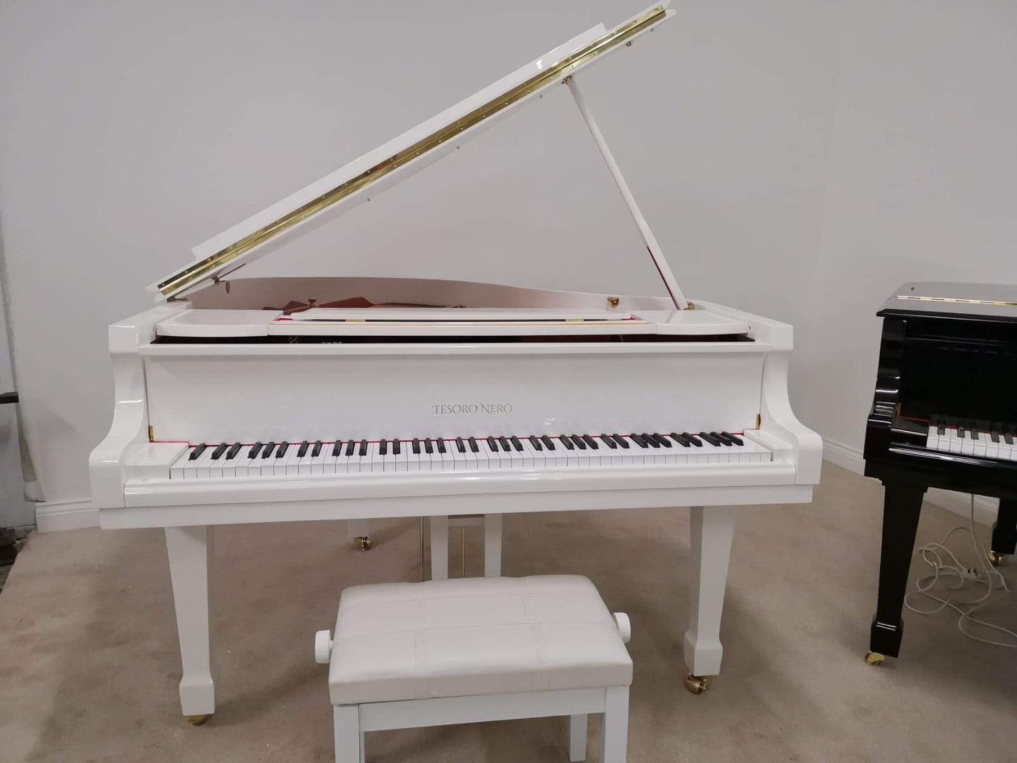 Self Playing White Baby Grand Piano