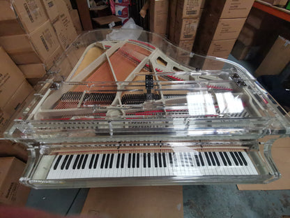 Transparent self-playing baby grand piano - piano that plays itself - UK
