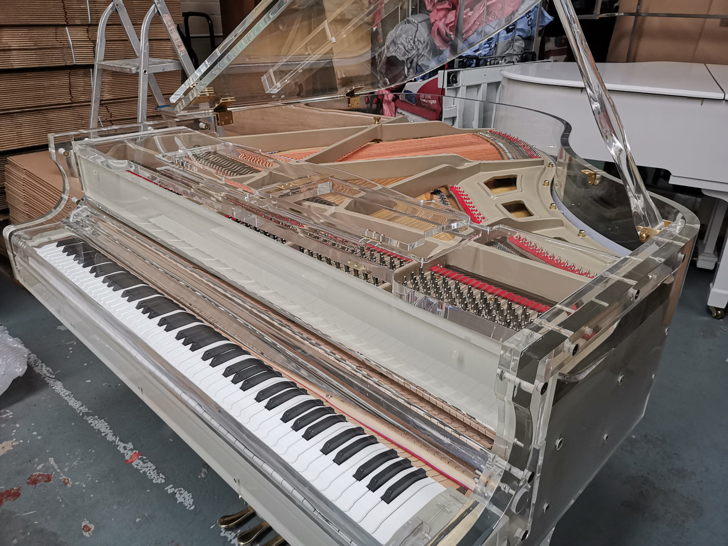 Self Playing Transparent Baby Grand Piano.