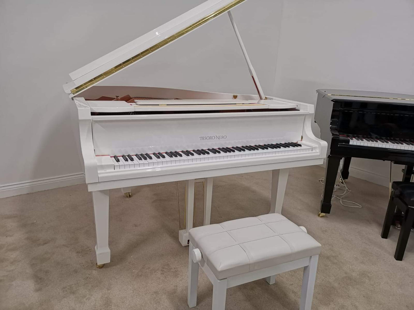 Self Playing White Baby Grand Piano